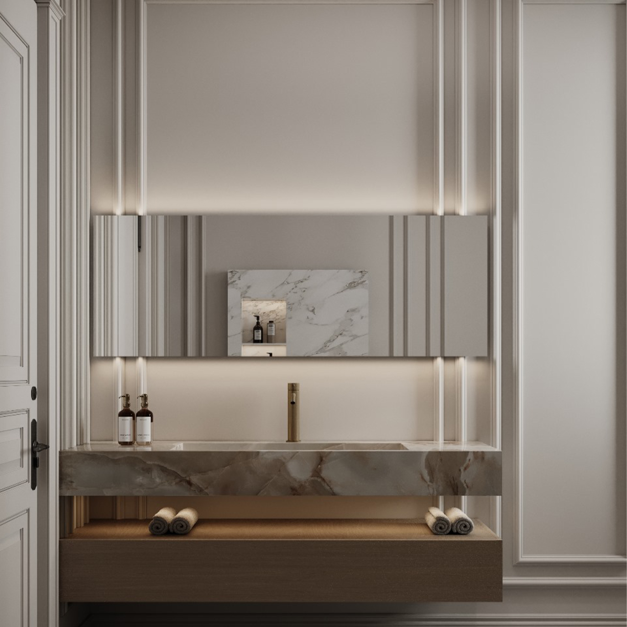 حمام مودرن يجمع بين الرخام الأبيض والإكسسوارات الذهبية المطفي